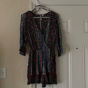 Francesca’s Floral loose fitting romper! Size XS